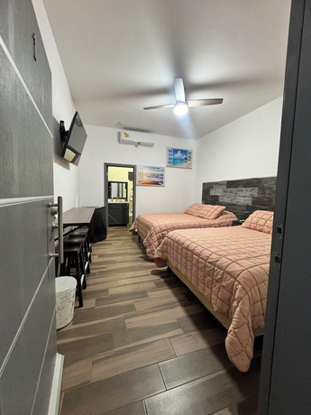 Imagen de la habitación del Hotel CUATRO PALMAS HOTEL. Foto 8