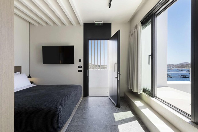 Imagen de la habitación del Hotel CUBIC Mykonos Seafront Design Suites. Foto 10