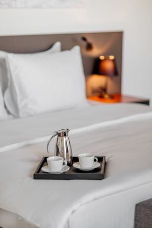 Imagen de la habitación del Hotel CUE Podgorica. Foto 13