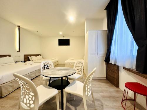 Imagen de la habitación del Hotel CYC Heritage at Georgetown, Penang. Foto 16
