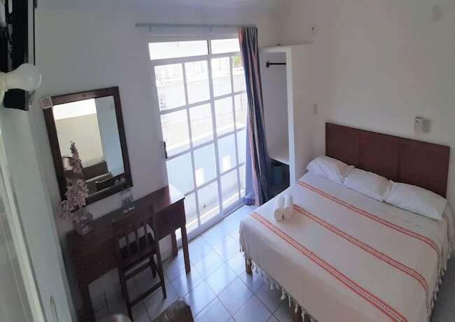 Imagen de la habitación del Hotel CZ. Foto 14
