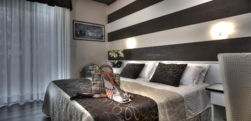 Imagen de la habitación del Hotel Ca\' D\'Oro Tre Stelle Superior Adults only. Foto 10