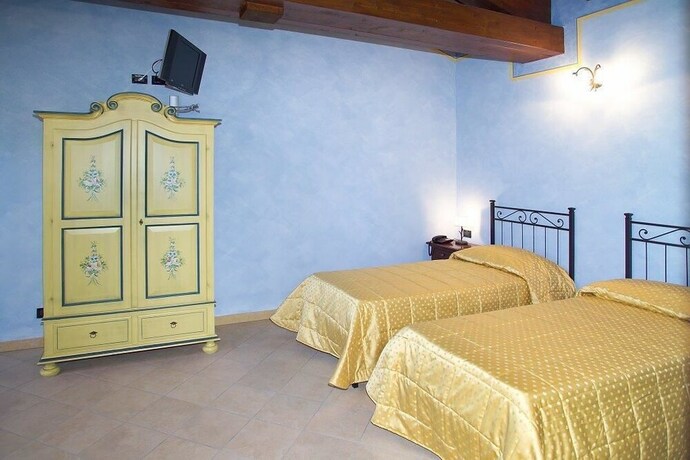 Imagen de la habitación del Hotel Ca' Del Rio Resort. Foto 7