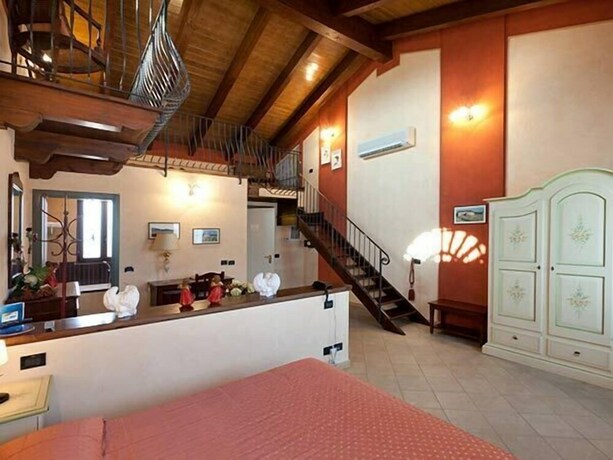 Imagen de la habitación del Hotel Ca' Del Rio Resort. Foto 11