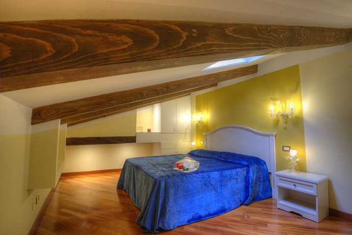 Imagen de la habitación del Hotel Ca' Dell'Arte Suite. Foto 13