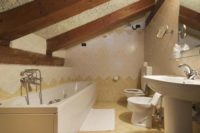 Imagen de la habitación del Hotel Ca Fiore. Foto 6