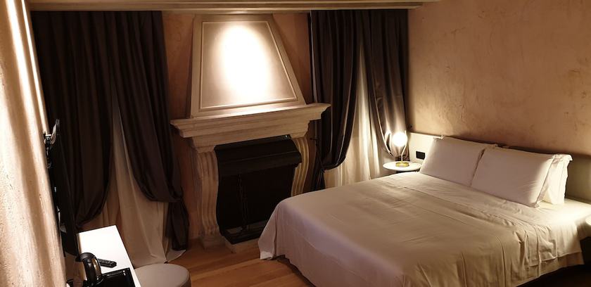 Imagen de la habitación del Hotel Ca' dei Proverbi Suites. Foto 2