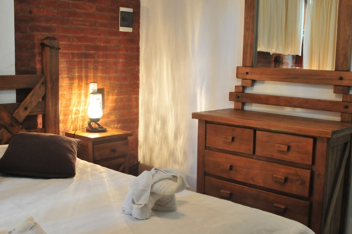 Imagen de la habitación del Hotel Cabanas and Apart Utopia. Foto 7