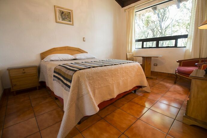 Imagen de la habitación del Hotel Caba&ntilde;a Suiza. Foto 17