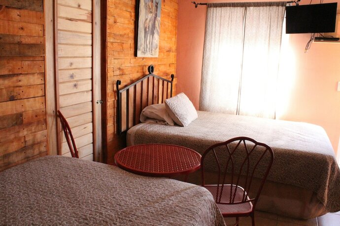Imagen de la habitación del Hotel Caba&ntilde;as Claro De Luna. Foto 14