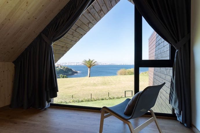 Imagen de la habitación del Hotel Cabañas De Canide. Foto 4