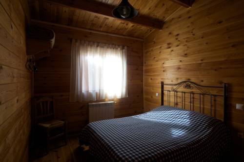 Imagen de la habitación del Hotel Caba&ntilde;as El Llano De Los Conejos. Foto 13