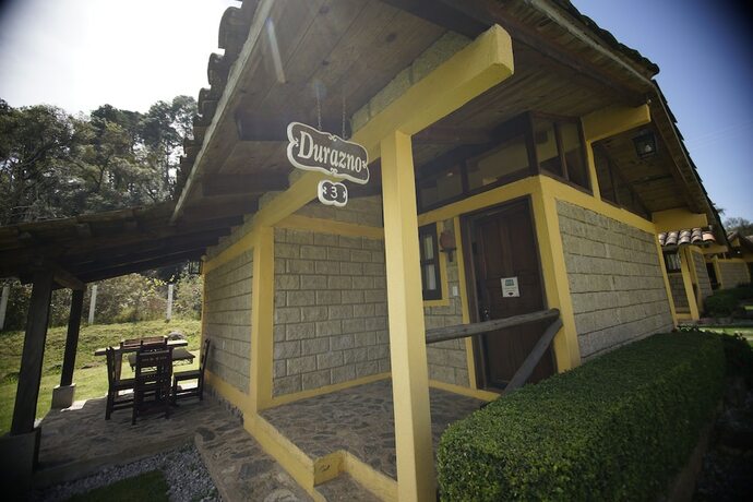 Imagen de la habitación del Hotel Caba&ntilde;as La Cascada. Foto 17