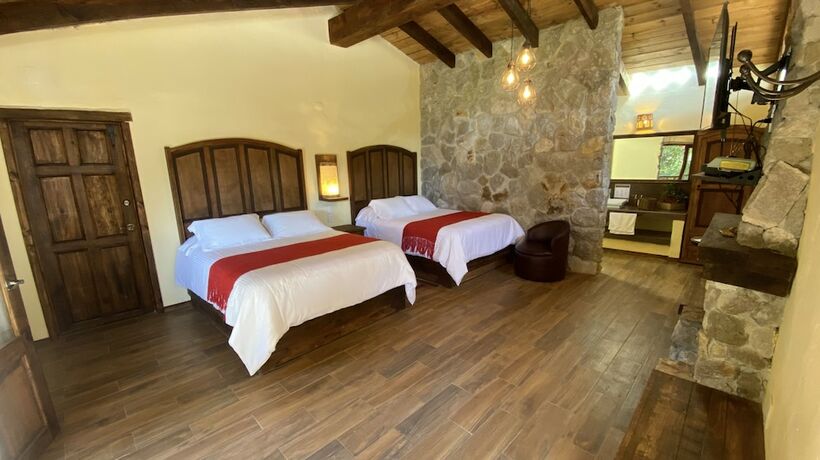 Imagen de la habitación del Hotel Caba&ntilde;as La Cascada. Foto 19