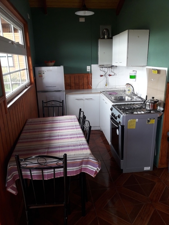 Imagen de la habitación del Hotel Caba&ntilde;as Lago Tyndall. Foto 11