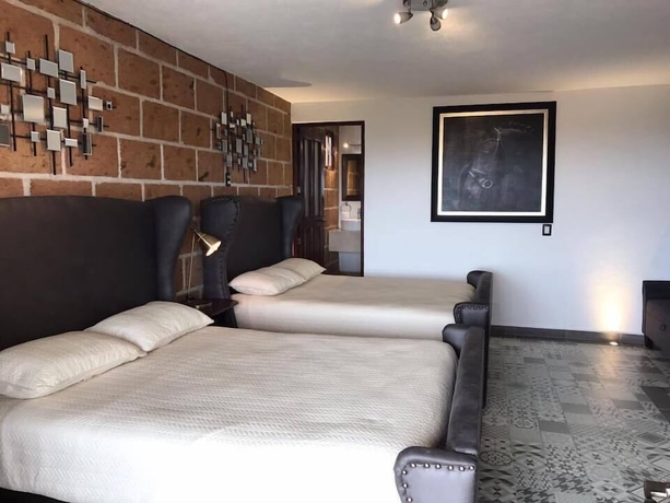 Imagen de la habitación del Hotel Caba&ntilde;as Rancho San Jorge. Foto 13