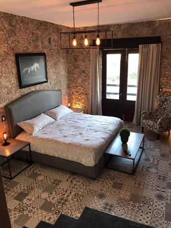 Imagen de la habitación del Hotel Caba&ntilde;as Rancho San Jorge. Foto 14
