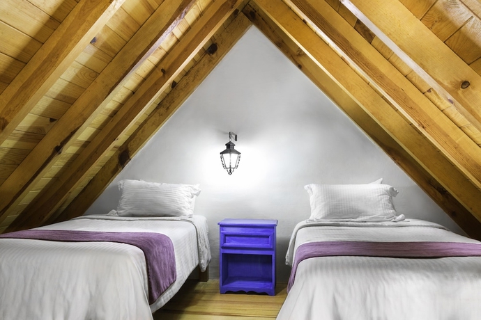 Imagen de la habitación del Hotel Caba&ntilde;as Sierra Mazamitla. Foto 7