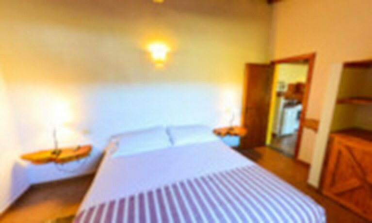 Imagen de la habitación del Hotel Caba&ntilde;as Tierras Altas. Foto 18