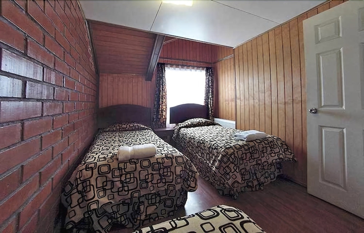 Imagen de la habitación del Hotel Caba&ntilde;as Ultima Esperanza. Foto 9