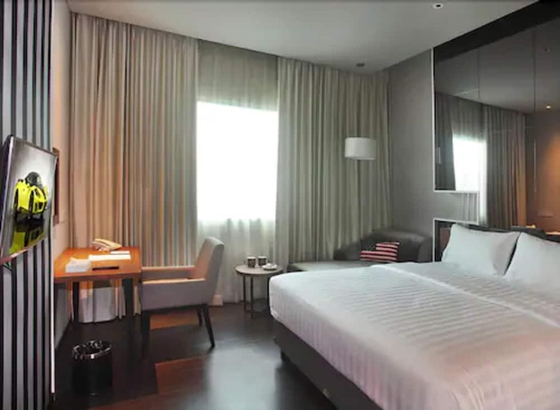 Imagen de la habitación del Hotel Cabin, Sunter Jaya. Foto 14