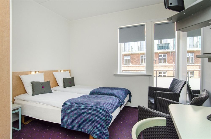 Imagen de la habitación del Hotel Cabinn City. Foto 15