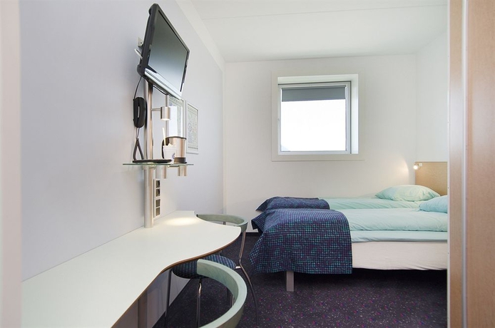 Imagen de la habitación del Hotel Cabinn Metro. Foto 11