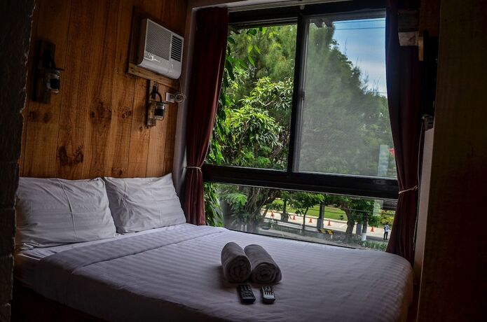 Imagen de la habitación del Hotel Cabins By Eco Tagaytay. Foto 18