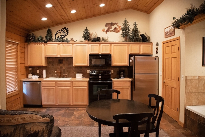 Imagen de la habitación del Hotel Cabins at Grand Mountain. Foto 4
