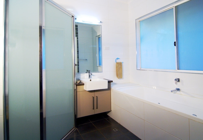 Imagen de la habitación del Hotel Cable Beachside Villas. Foto 17