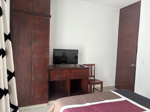 Imagen de la habitación del Hotel Cabo Boutique Condos. Foto 2