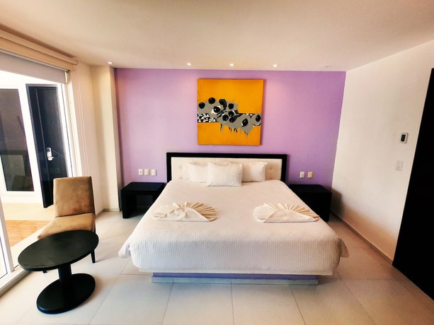 Imagen de la habitación del Hotel Cache Boutique - Adults Only. Foto 4