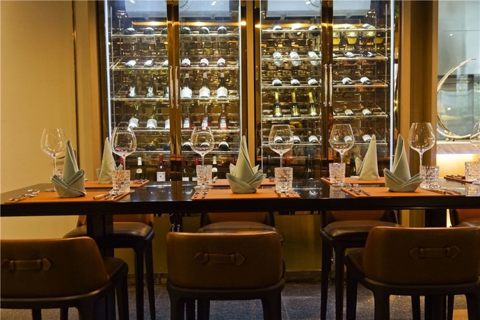 Imagen del bar/restaurante del Hotel Cachet Boutique Kunming Artime. Foto 6