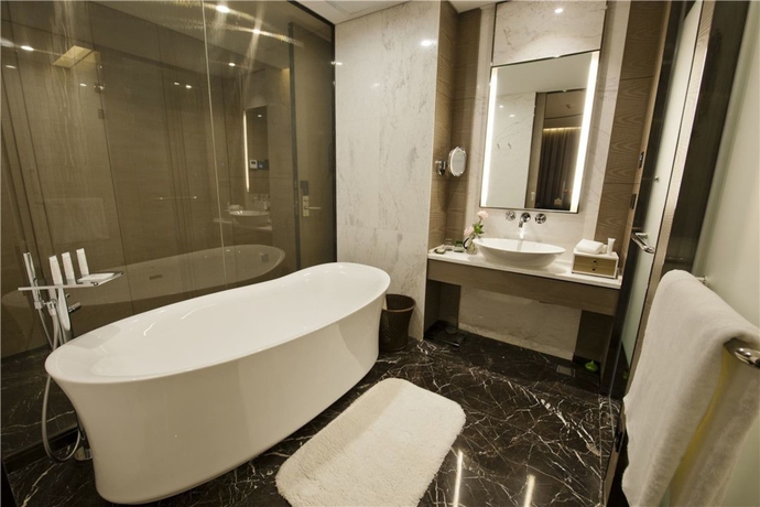 Imagen de la habitación del Hotel Cachet Boutique Kunming Artime. Foto 10