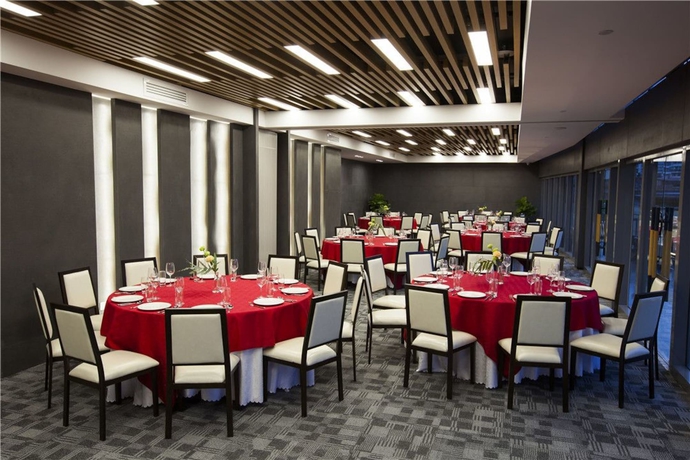 Imagen del bar/restaurante del Hotel Cachet Boutique Kunming Artime. Foto 8