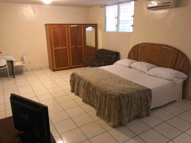 Imagen de la habitación del Hotel Cacique Villa. Foto 11