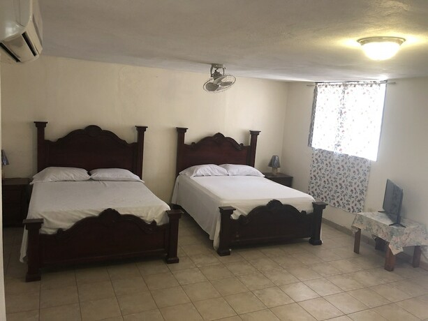 Imagen de la habitación del Hotel Cacique Villa. Foto 14
