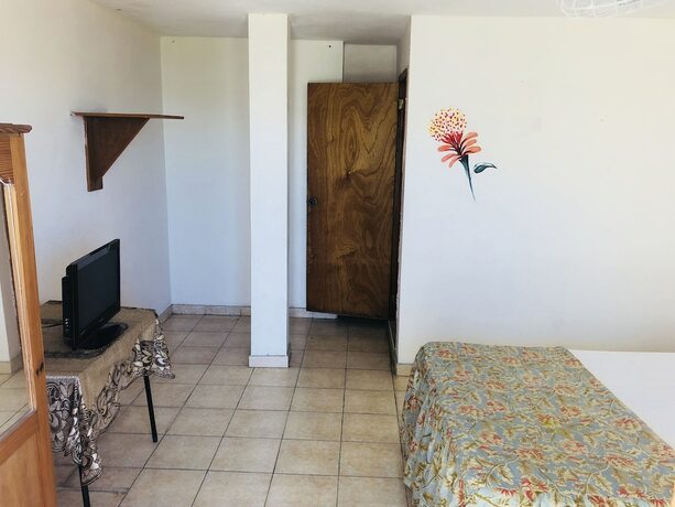Imagen de la habitación del Hotel Cacique Villa. Foto 15