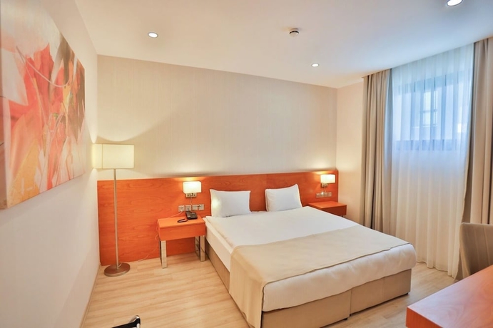 Imagen de la habitación del Hotel Caddemm Inn. Foto 2