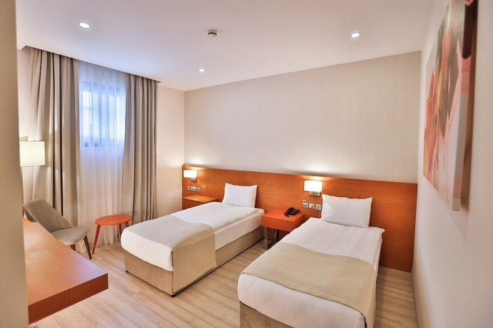 Imagen de la habitación del Hotel Caddemm Inn. Foto 3