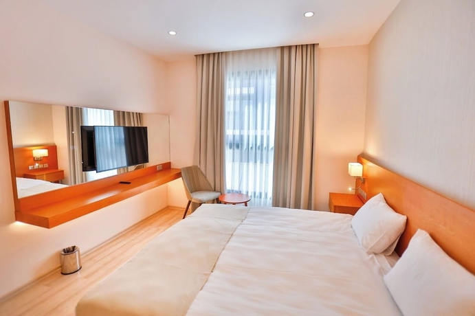Imagen de la habitación del Hotel Caddemm Inn. Foto 6