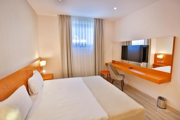 Imagen de la habitación del Hotel Caddemm Inn. Foto 8