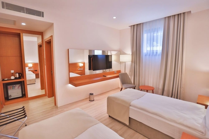 Imagen de la habitación del Hotel Caddemm Inn. Foto 11