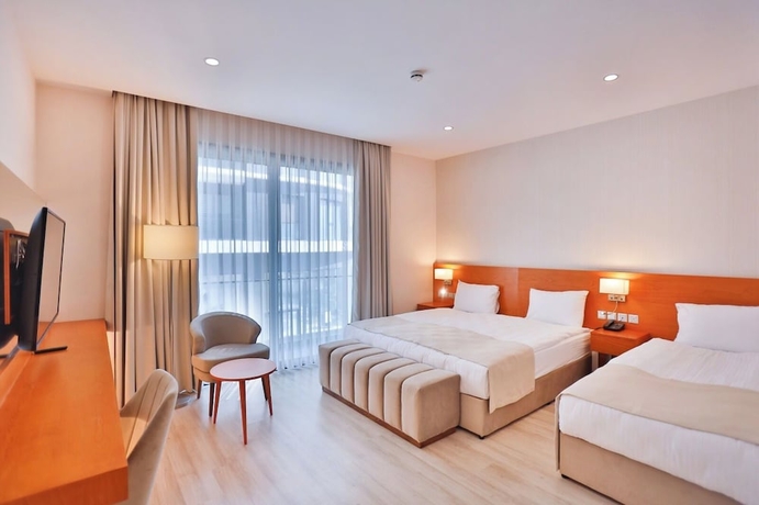 Imagen de la habitación del Hotel Caddemm Inn. Foto 12