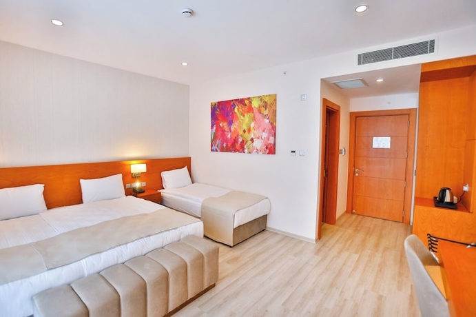 Imagen de la habitación del Hotel Caddemm Inn. Foto 13