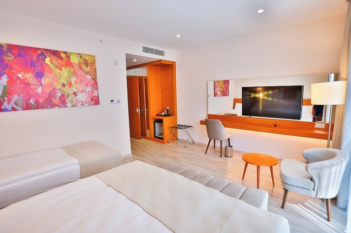 Imagen de la habitación del Hotel Caddemm Inn. Foto 14