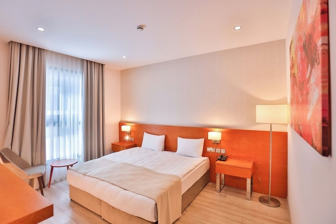Imagen de la habitación del Hotel Caddemm Inn. Foto 15
