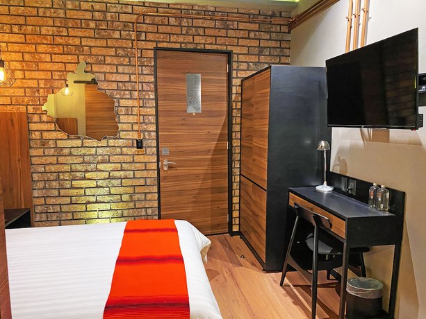 Imagen de la habitación del Hotel Cadillac Boutique. Foto 5