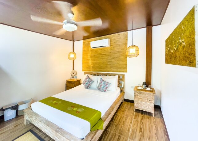 Imagen de la habitación del Hotel Cadlao Resort and Restaurant. Foto 27