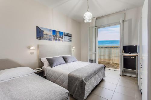 Imagen de la habitación del Hotel Caesar, Lido di Savio. Foto 2